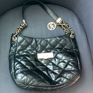 Michael Kors black bag with pockets and 2 compartments
